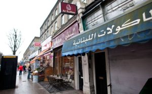 Picture of Muslim-owned shops in Acton, west London, from the Telegraph. Two shops are clearly visible, one closed down, both with clearly visible Arabic lettering; rest are out of focus.