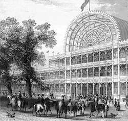 Drawing of the Crystal Palace, a glass and iron building with a flag flying above it, with a group of people, some on horseback, in front of it, with a tree to the left.