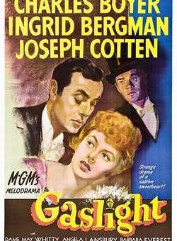 A 1944 poster with drawings of Charles Boyer, Ingrid Bergman and Joseph Cotton (two white men and a white woman, with the woman at the bottom), with their names in yellow capital letters at the top and at the bottom, the words "MGM's melodrama: Gaslight".