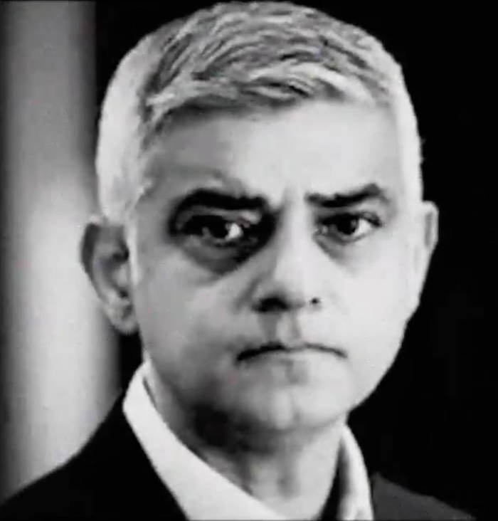 A black-and-white picture of Sadiq Khan, the mayor of London, a middle-aged clean-shaven Asian man. In this picture he has a noticeably dour expression.